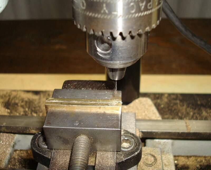589 drilling the holes.JPG